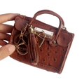 thumbnail image 1 of Monedero portátil con borlas de moda europea y americana, estuche para llaves con patrón de avestruz, mini bolso de mano, bolso de joyería para muñecas, 1 of 4