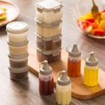 thumbnail image 3 of Botellas exprimibles JM plástico gris Con tapa giratoria para condimentos aceites salsas, 3 of 5