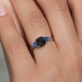 thumbnail image 5 of Gem Stone King 10K White Gold Black Onyx and Blue Created Sapphire 3-Stone Engagement Ring for Women (2.01 Cttw, 7MM Cushion Checkerboard and 4MM Trillion, Size 9), 5 of 6