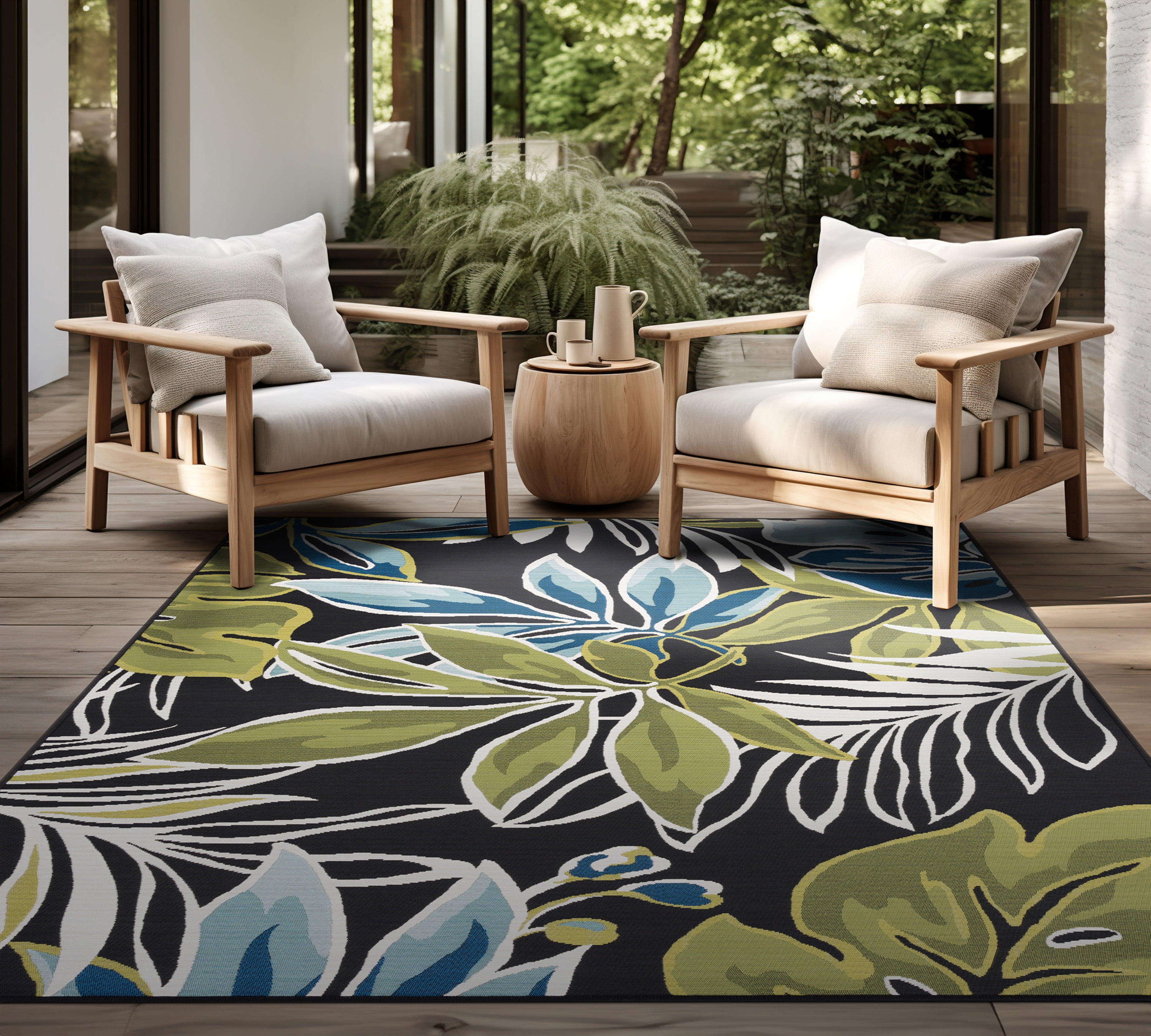 Stunning Transitional 5' x 7' Black and Blue Polypropylene Outdoor Area Rug