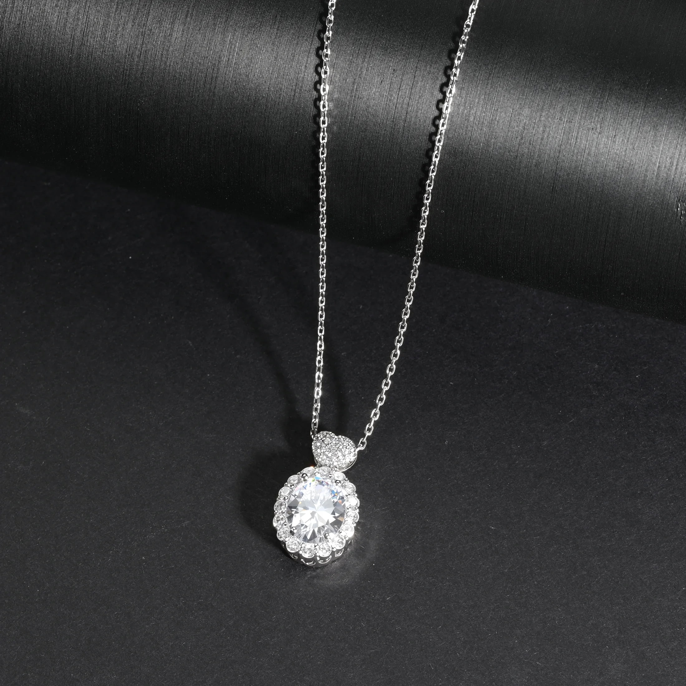 MENGLISI Clear Cubic Zirconia Oval Halo Pendant Necklace for Women, White Gold Plated Copper