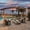 Brown, variant on MeetLeisure 11'x11' Outdoor Pergola with Sidewalls, Arched Top Metal Pergola with Steel Frame & Textilene Canopy for BBQ Party Family Gathering, Beige