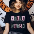 thumbnail image 3 of Holly Jolly Nurse Graphic T-Shirt with Fun Letter Design, Heliconia, Size 2XL, 3 of 6
