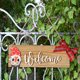thumbnail image 3 of Placa de puerta navideña con diseño de Rudolf y lazo decorativo, ideal para dar la bienvenida en esta temporada festiva. Hecha en madera, perfecta como regalo especial., 3 of 6