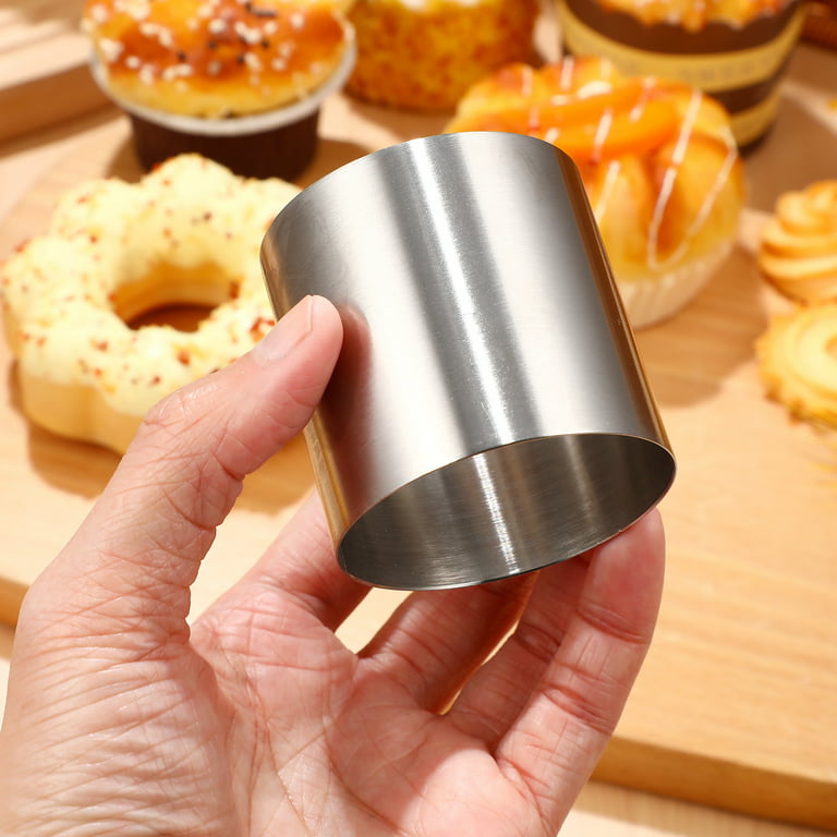 Set of 8 Stainless steel rings for cakes. Height: 40 mm.