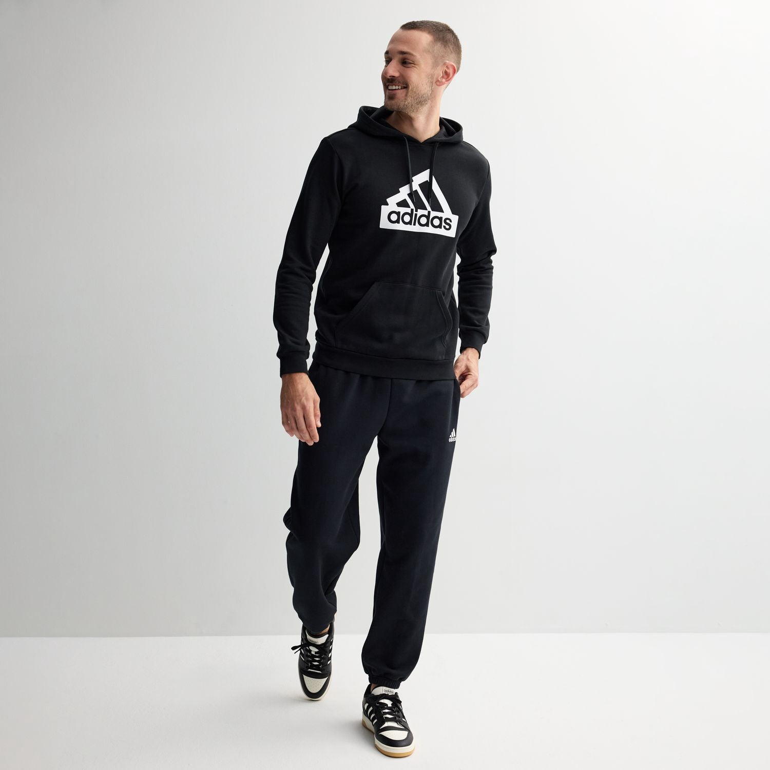 Men's adidas Essentials Graphic Modern Hoodie Color: Black Size: S