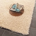 thumbnail image 3 of SAFAVIEH Clyde Solid Plush Polyester Shag Area Rug, Cream, 4' x 6', 3 of 7