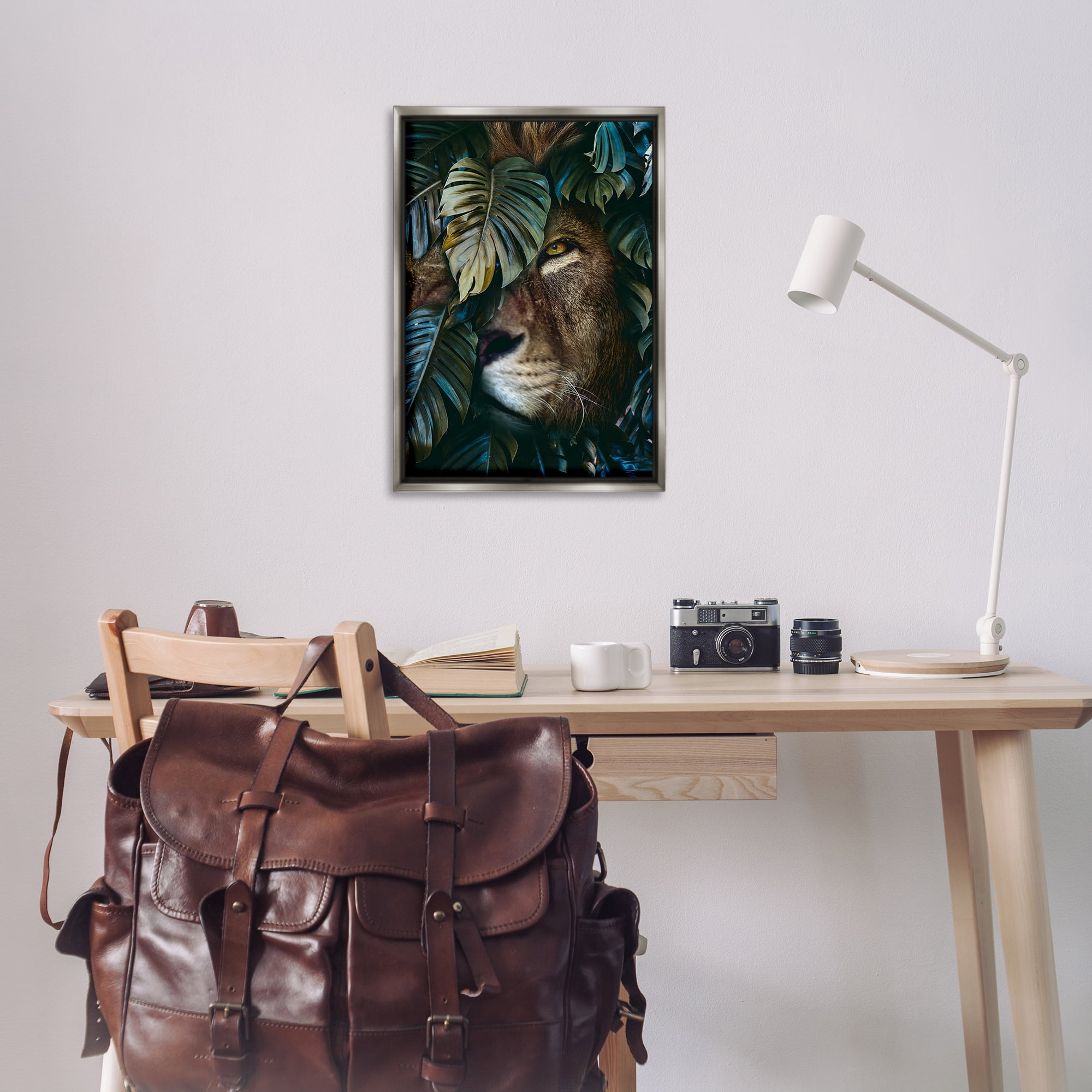 Stupell Industries Lion Peering Monstera Leaves Plants & Flowers Painting Gray Floater Framed Canvas Art Print Wall Art, 21 x 31