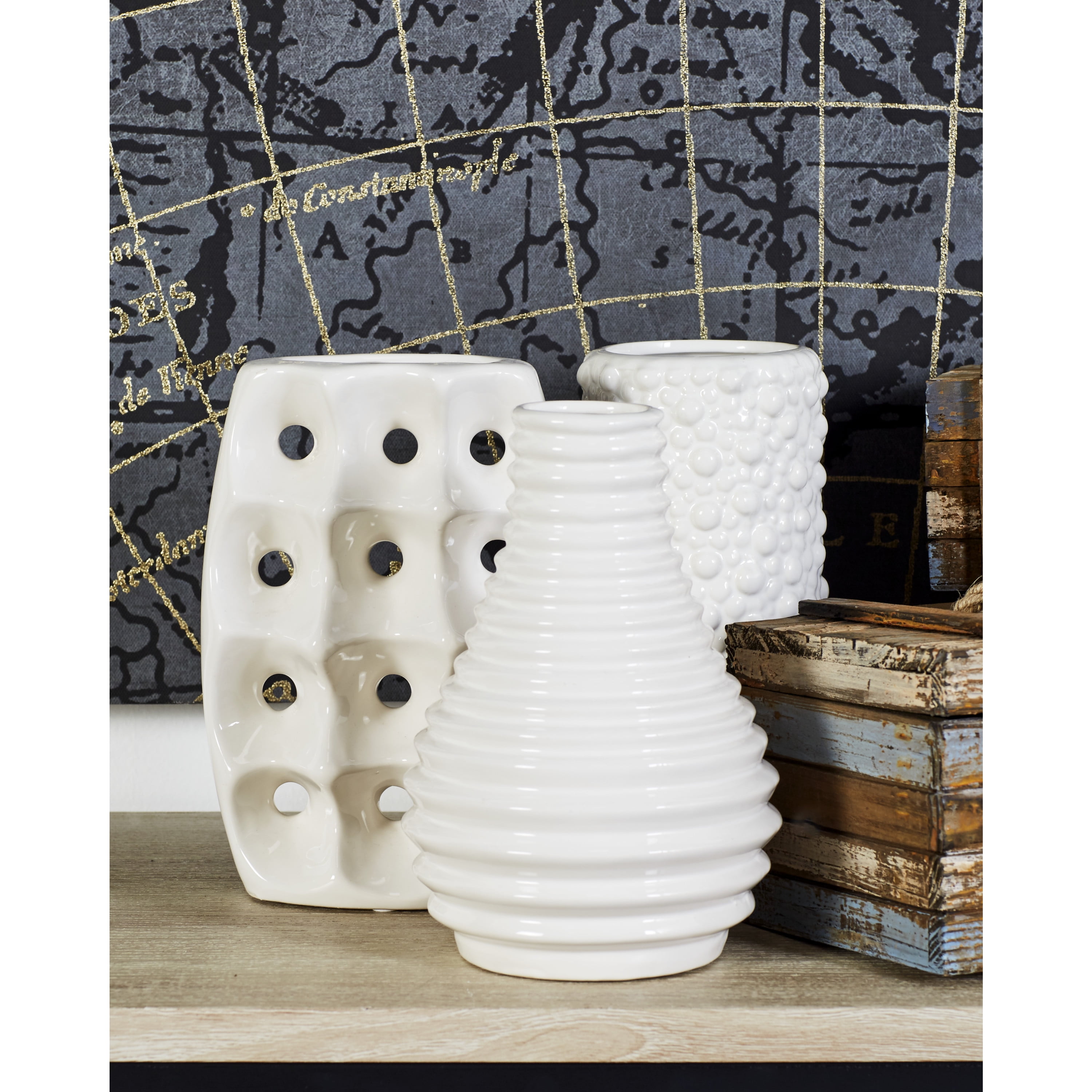 CosmoLiving by Cosmopolitan 5"W, 8"H White Ceramic Vase with Varying Patterns, Set of 3