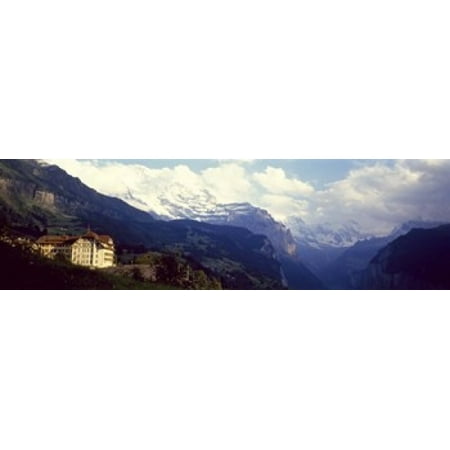 Hotel with mountain range in the background Swiss Alps Switzerland Canvas Art - Panoramic Images (15 x