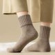 thumbnail image 3 of Calcetines lisos de media pantorrilla, diseñados para hombres y mujeres que valoran la durabilidad y un toque navideño. Calcetines de nailon., 3 of 3