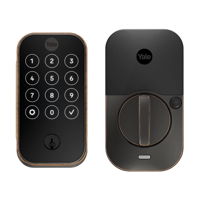 yale assure lock 2 con wi-fi Cerradura electrónica Yale Assure Lock 2 con teclado táctil numérico iluminado y cerradura con llave visible en módulo exterior, unidad interior con perilla giratoria y logo Yale en acabado negro con borde bronce, vista frontal de ambos módulos sobre fondo blanco; a menudo se usa para gestionar accesos y compartir códigos desde la app.