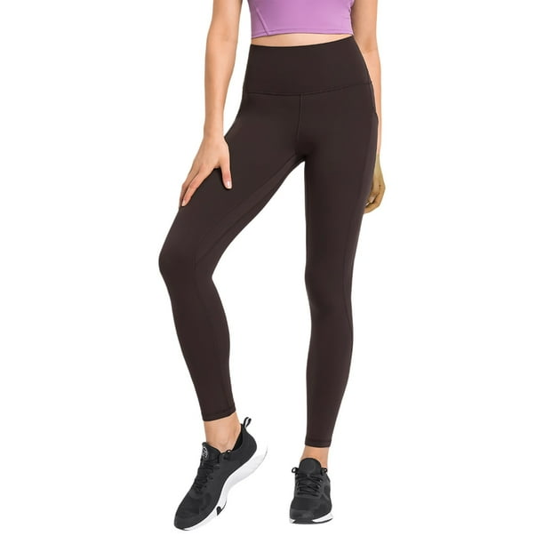 Pantalones de yoga de alto rendimiento con bolsillos laterales: leggings deportivos, nailon y spandex, ajuste ceñido y sujeción.