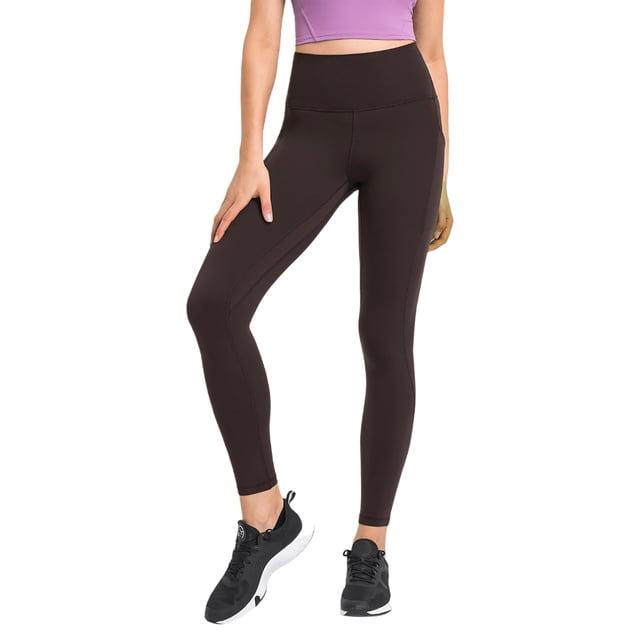 Pantalones de yoga de alto rendimiento con bolsillos laterales: leggings deportivos, nailon y spandex, ajuste ceñido y sujeción.