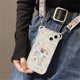 thumbnail image 1 of Estuche con cordón cruzado con orejas de oso y flor bonita coreana para iPhone 14 13 12 11 Pro XS Max X XR 7 8 Plus, funda blanda a prueba de golpes con correa Tan Jianjun unisex, 1 of 2