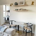 thumbnail image 2 of Round Dining Table combines timeless elegance with contemporary design.Luxurious faux marble top, brushed gold detailing, and a sturdy matte black base., 2 of 5