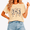 1-apricot, variant on Cozymy Dancing Bones Halloween Joy Hand Drawn Graphic Tee for Women Crew Neck Short Sleeve
