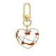 thumbnail image 1 of Cartoon tres asiento bicicleta Bretaña País cultura Llavero de metal en forma de corazón dorado, 1 of 3