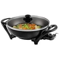 thumbnail image 1 of Wok eléctrico OVENTE con revestimiento antiadherente, sartén familiar de 33 cm, 1400 W de potencia, temperatura ajustable, tapa de vidrio templado, asas frías al tacto y superficie de freír fácil de l, 1 of 5