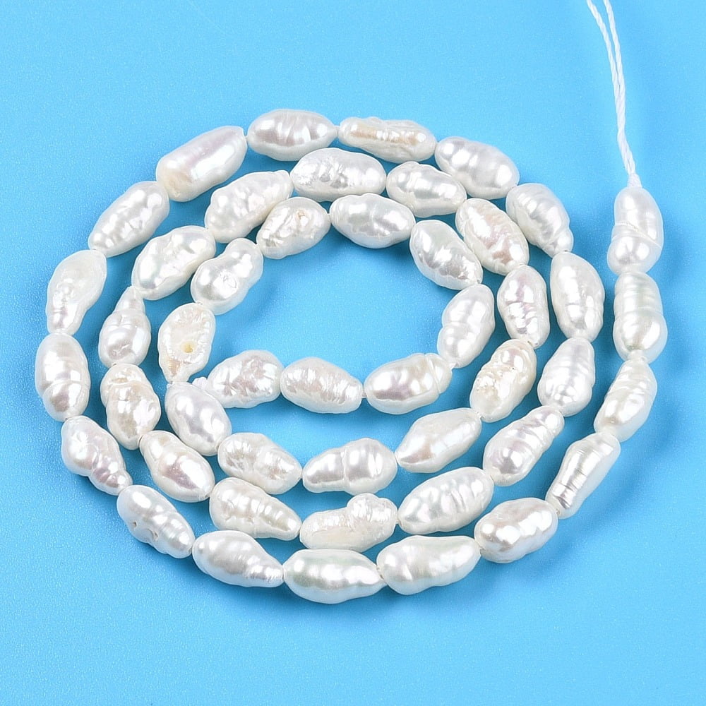 Cultured Freshwater Pearl Beads Strands Baroque Pearls Keshi Pearl Beads Two Sides Polished Creamy White 7~14x4~5.5x4~5.5mm Hole: 0.5mm about 34~45pcs/strand 13.98~14.57 inch(35.5~37cm)