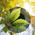 thumbnail image 3 of Vibrant Metal Hanging Wind Spinner with Concentric White Lines & Green Leaf Design Perfect for Yard & Garden Decor, 3 of 6