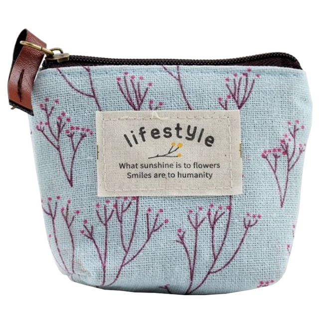 Canvas Coin Purse Creative Lovely Zipper Change Purse Change Pouch for Women. This compact coin pouch, made of durable canvas material, features a light blue background with a delicate purple floral pattern and a stitched label reading 'lifestyle.' Measuring 9 x 2 x 9 cm (3.54 x 0.79 x 3.54 in), it is ideal for holding coins, cards, keys, or small items. The zipper closure and leather pull tab add functionality and style.