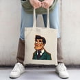 thumbnail image 2 of Stylish Canvas Tote Bag featuring a cartoon character in a green suit and white shirt perfect for shopping travel and parties, 2 of 4