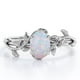 thumbnail image 1 of JeenMata Inspirado en la Naturaleza: Anillo de Compromiso con Engaste de Cuatro Puntas y Ópalo Arcoíris de Forma Ovalada de 1,3 Quilates, Chapado en Oro Blanco de 18 K sobre Plata, 1 of 5