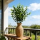 thumbnail image 1 of Ramo de hojas de eucalipto artificiales | Plantas verdes de plástico de 7 tenedores | Estilo Moneywort | Paquete de 5 | Vegetación artificial de 35 cm para decoración del hogar y la oficina, 1 of 7