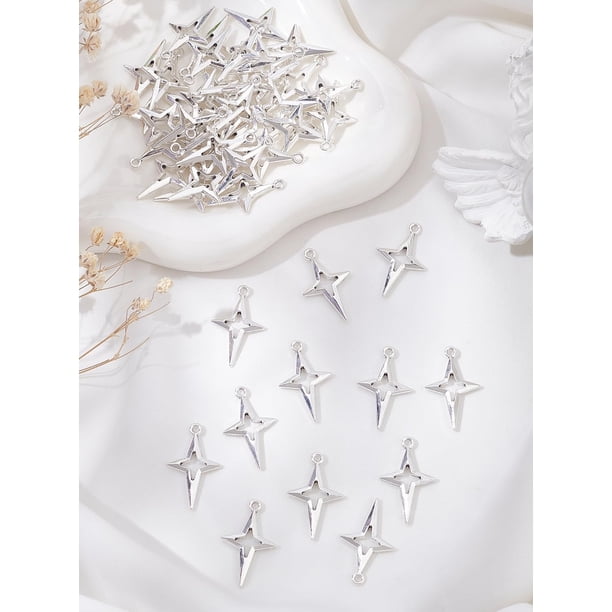 50 piezas de dijes de estrella hueca de plata de cuatro puntas, colgantes de moda en forma de estrella, decoración
