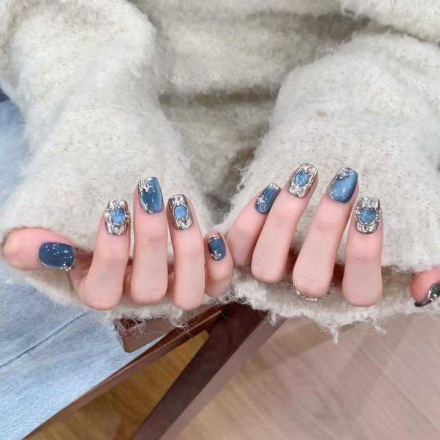 Armadura de mano azul Temperamento Fototerapia Arte de uñas Piezas de uñas blancas Arte de uñas corto Productos terminados