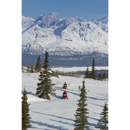 Couple Snowmobiling In Denali State Park With The Alaska Range And Mooses Tooth In The Background Southcentral Alaska Spring Poster Print by Jeff Schultz  Design