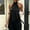 Black, variant on Women's Elegant Satin Halter Sleeveless Solid Color Top – Irregular Hem with Lace Splicing Backless Cutout Detail Apricot,L