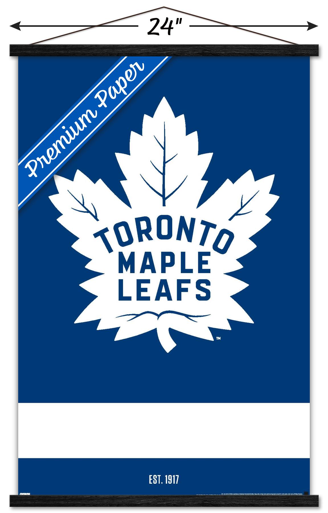 NHL Toronto Maple Leafs - Logo 21 Wall Poster with Wooden Magnetic Frame, 22.375" x 34"