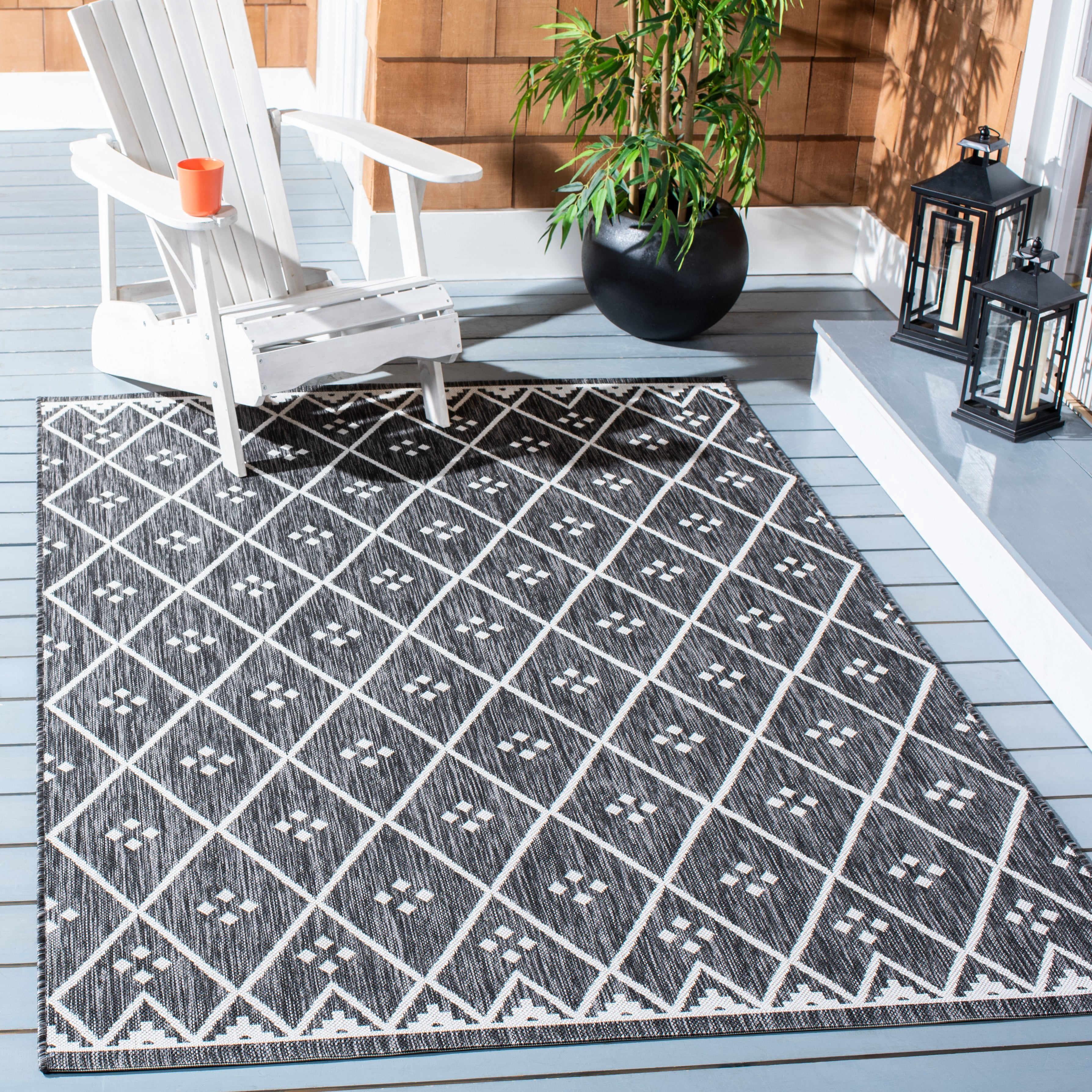 SAFAVIEH Courtyard Wasif Geometric Indoor/Outdoor Area Rug, Black/Ivory, 9' x 12'