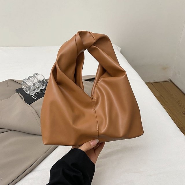 Bolso de mano de estilo nuevo para niñas, de moda, informal, con diseño de nicho, estilo cubo plisado, 2025
