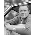 thumbnail image 2 of Portrait of mature man looking through car window Poster Print (24 x 36), 2 of 4