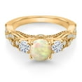 thumbnail image 2 of Gem Stone King 18K Yellow Gold Plated Silver White Ethiopian Opal and White Moissanite Engagement Ring for Women (1.03 Cttw, Gemstone, Round Cabochon 6MM and 3MM, Size 9), 2 of 4