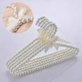 thumbnail image 4 of Matsuzay Juego de 5 perchas esenciales para ropa de adultos para bodas con perlas artificiales y detalle de lazo. Almacenamiento y organización del hogar Percha de ropa blanca, 4 of 6