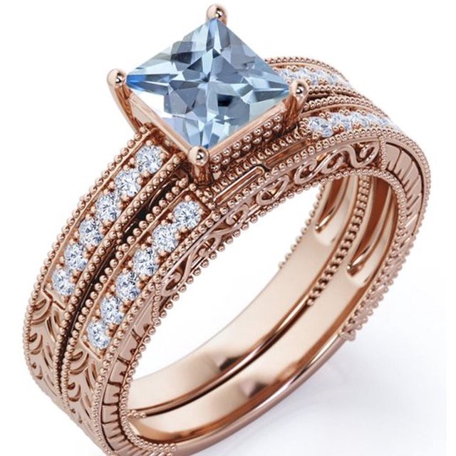 JeenMata Conj. Nupcial Estilo Eduardiano con Borde Milgrain de 1,75 Ct en Corte Princesa, Aguamarina Azul y Moissanita, Pavé de 4 Puntas, Enchapado en Oro Rosa de 18 K sobre Plata