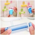 thumbnail image 1 of Vaidha Rolling Toothpaste Dispenser Tube Squeezer Sucker Hanger Gadget Tool, 1 of 6