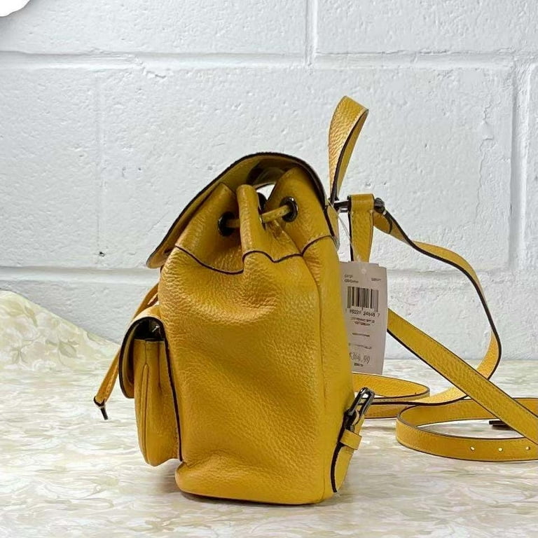 Coach gold backpack hotsell