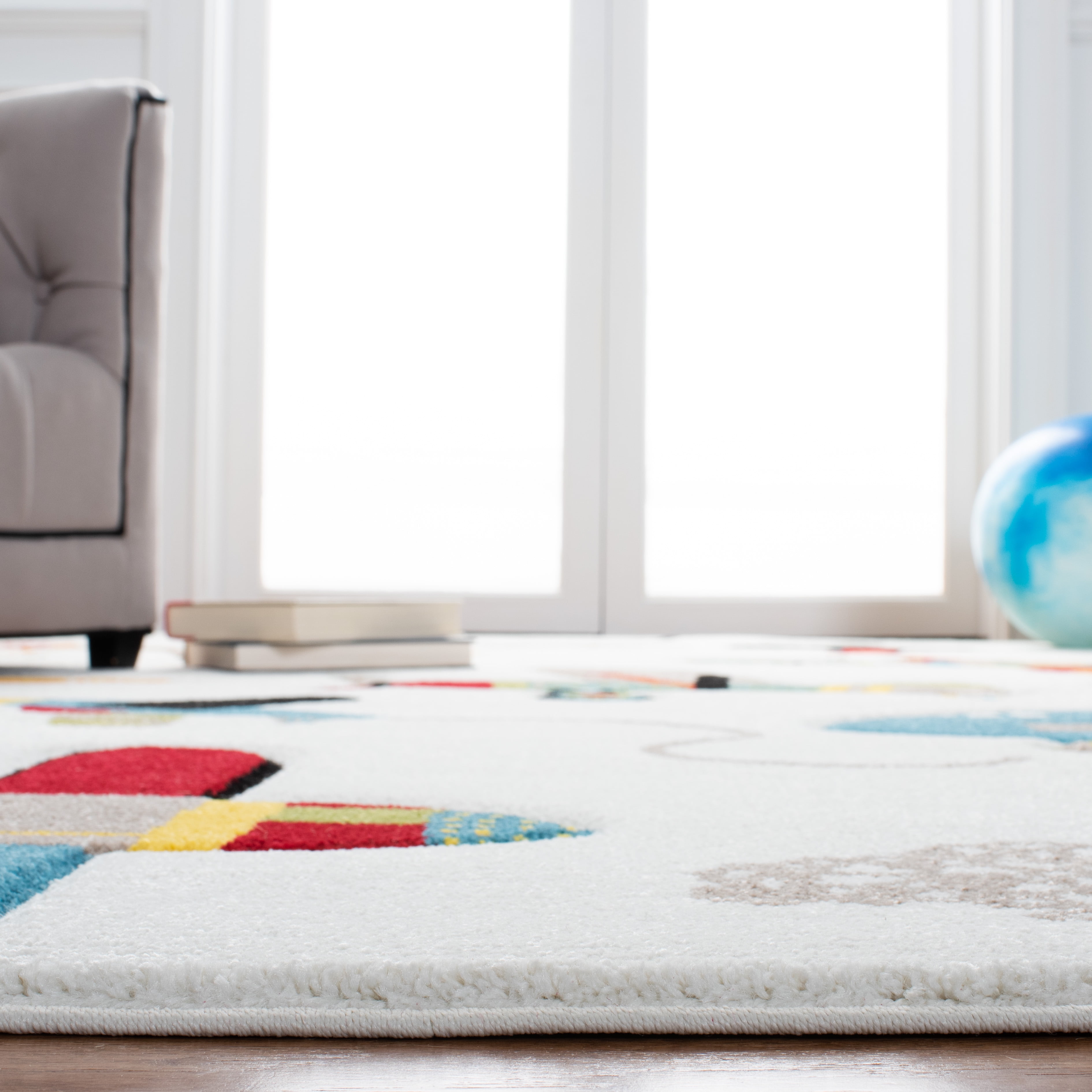 SAFAVIEH Carousel Kids Caroline Airplanes Area Rug, Ivory/Blue, 8' x 10'