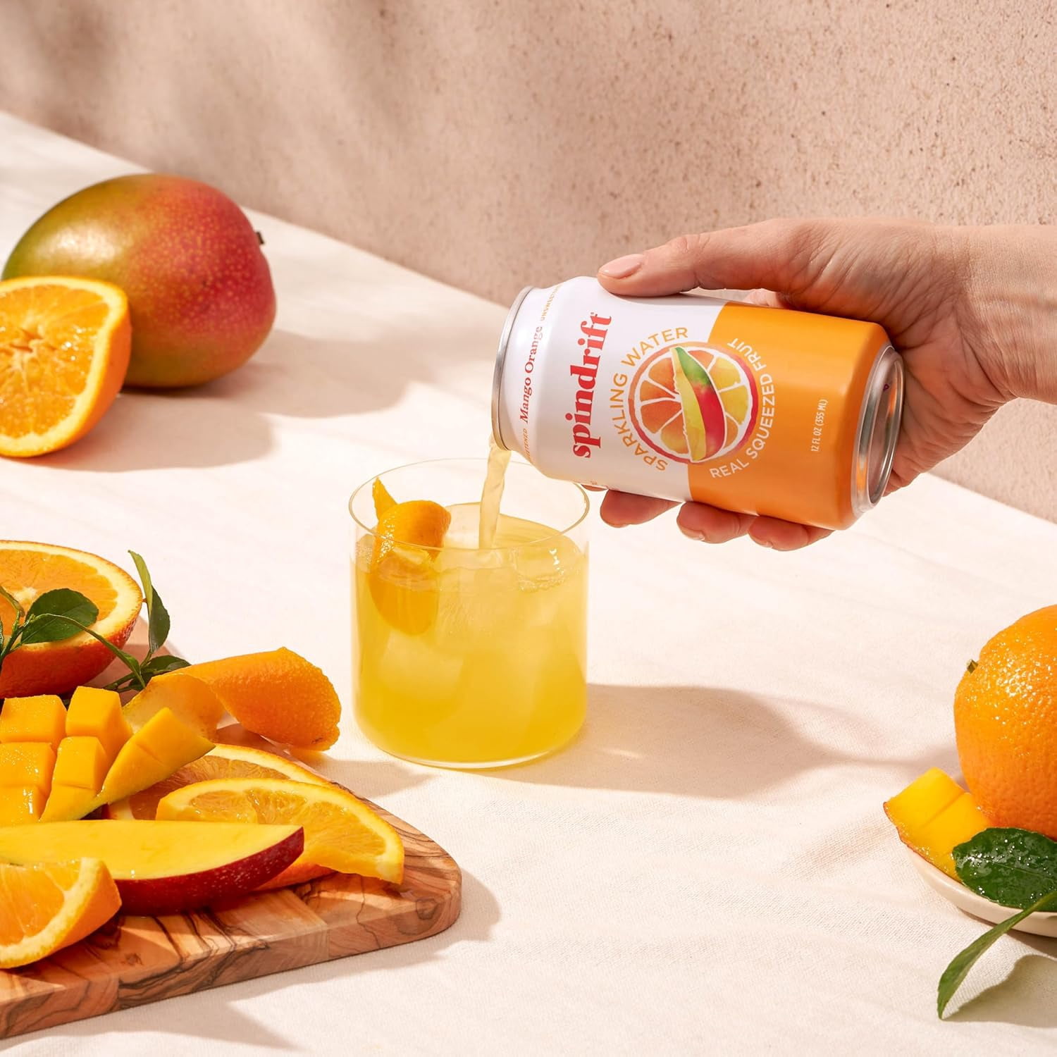 Spindrift Sparkling Water, Mango Orange, Made with Real Squeezed Fruit, 12 fl oz, 8 Count, No Sugar Added, 12 Calories per Can