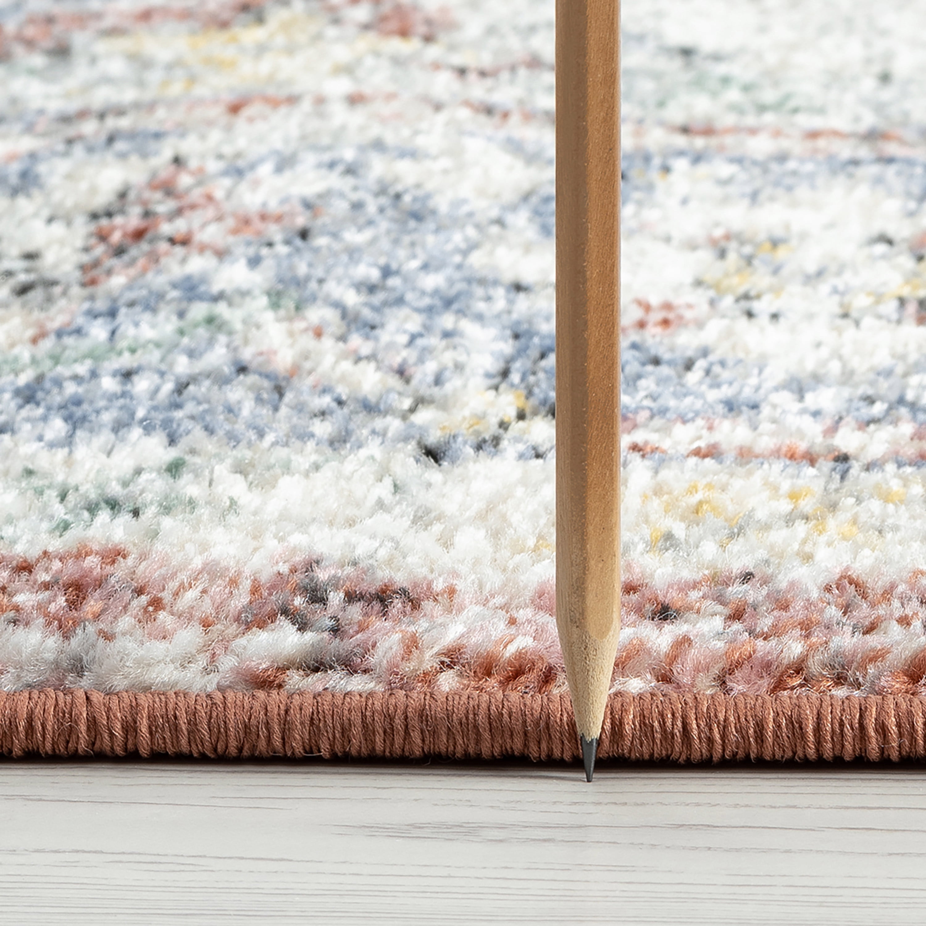 Addison Traditional 5' x 7' Rust and Blue Polypropylene Indoor Area Rug