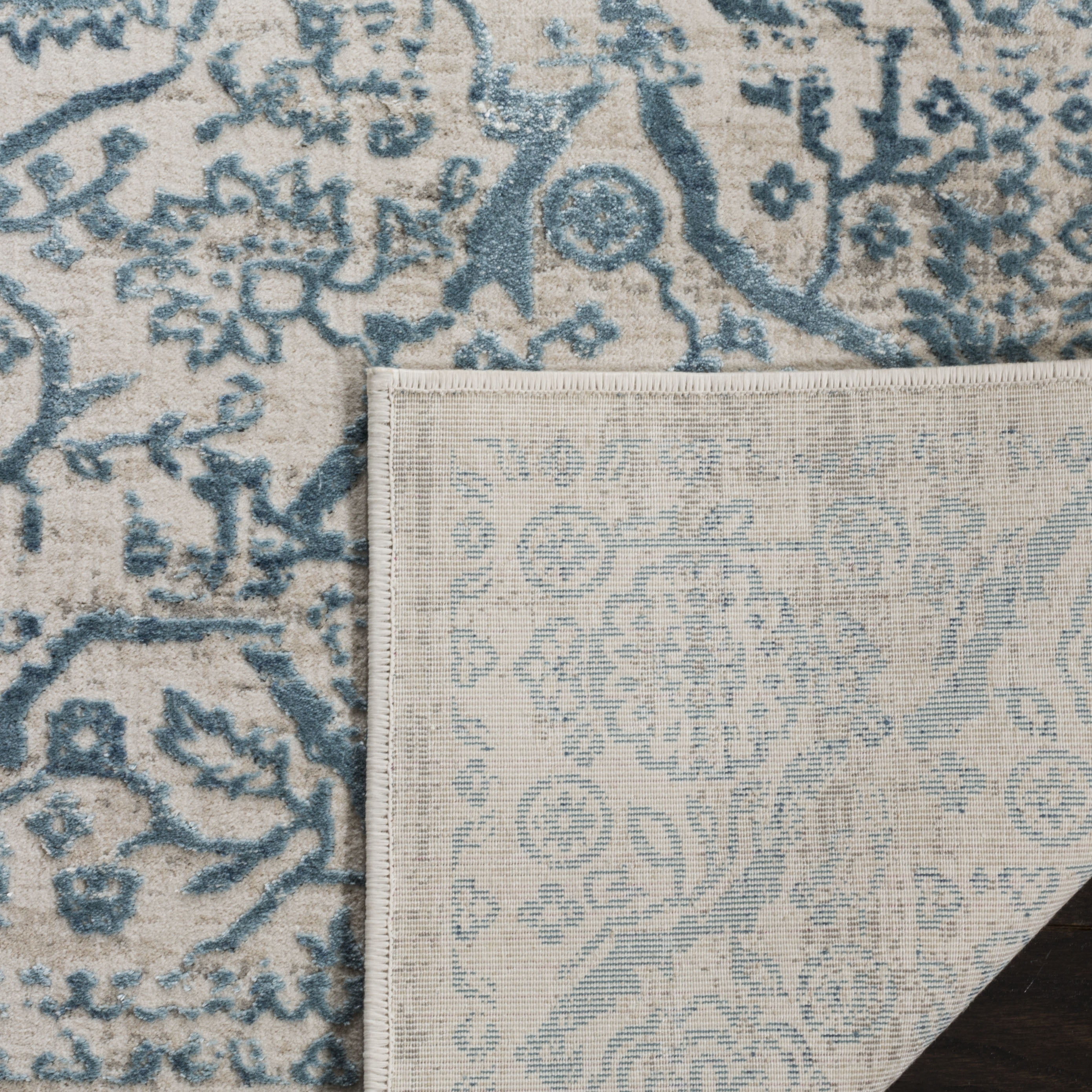 SAFAVIEH Princeton Xavier Floral Bordered Area Rug, Blue/Beige, 5'1" x 7'6"