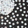 thumbnail image 4 of 24 pc Preciosaeg Beads Czech Bicone(451 69 302 Rondelle) 01000 20000 White Opal AB 2x 4mm, 4 of 5