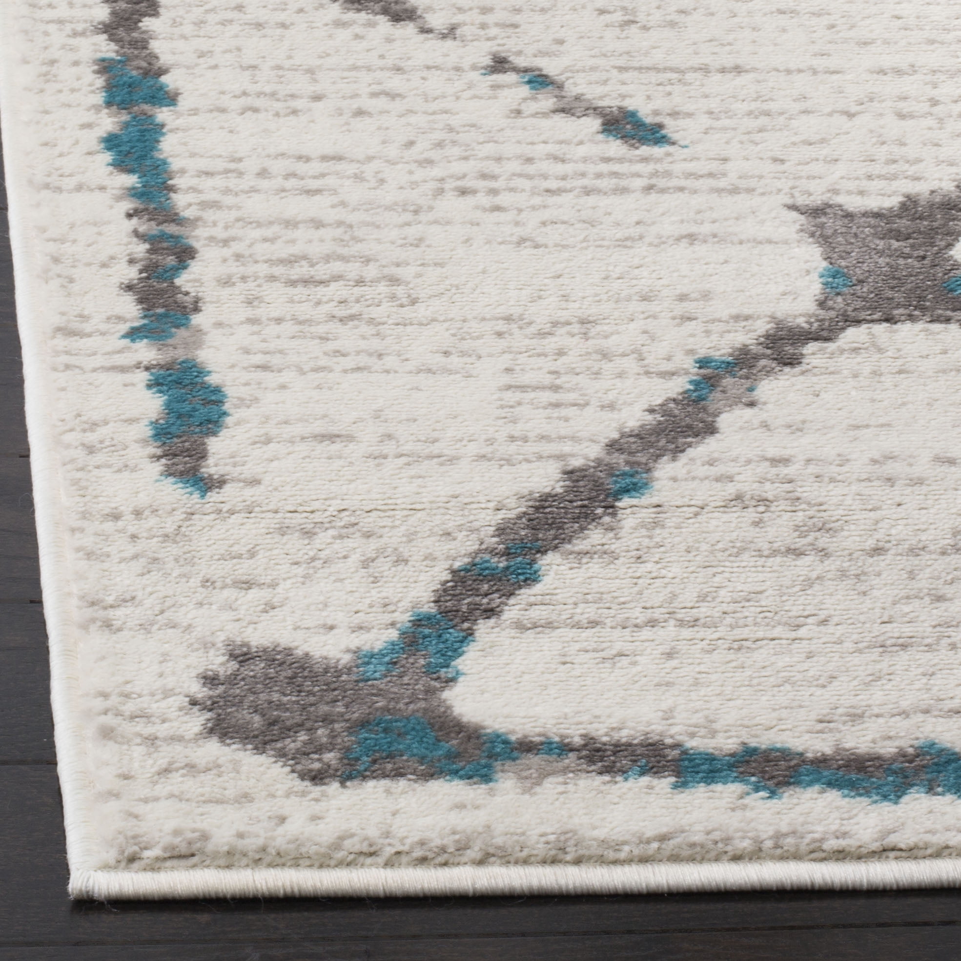 SAFAVIEH Skyler Leontyne Geometric Area Rug, Ivory/Blue, 9' x 12'