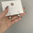 thumbnail image 1 of Pendientes de diamantes con forma de estrella para mujer, diseño de nicho, pendientes de alta gama, pendientes de aguja de plata neutra, 1 of 1