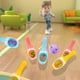 thumbnail image 4 of Juego interactivo de bolos con dinosaurios para niños, ideal para juegos de rol y juegos de jardín de infancia., 4 of 5